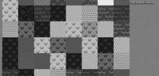 Fig. 3 Among the aspects of gameplay to be defined are the kinds of terrain
that the player will (or will not) be able to traverse. Pictured here are varying
densities of grass, dirt, rock, sand, and water. This image was generated from
the same text as figure 2.