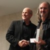 Dave Ferguson, IDMAA Awards Chair (left), presents the Lifetime Achievement Award to Richard Hilleman, Chief Creative Director, Electronic Arts (right).